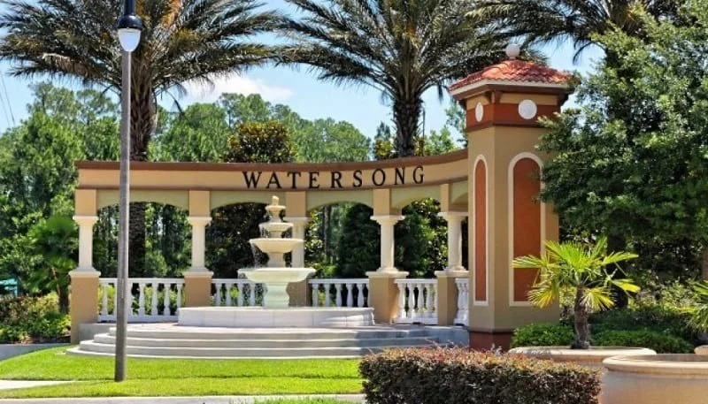 Watersong Resort entrance sign and fountain