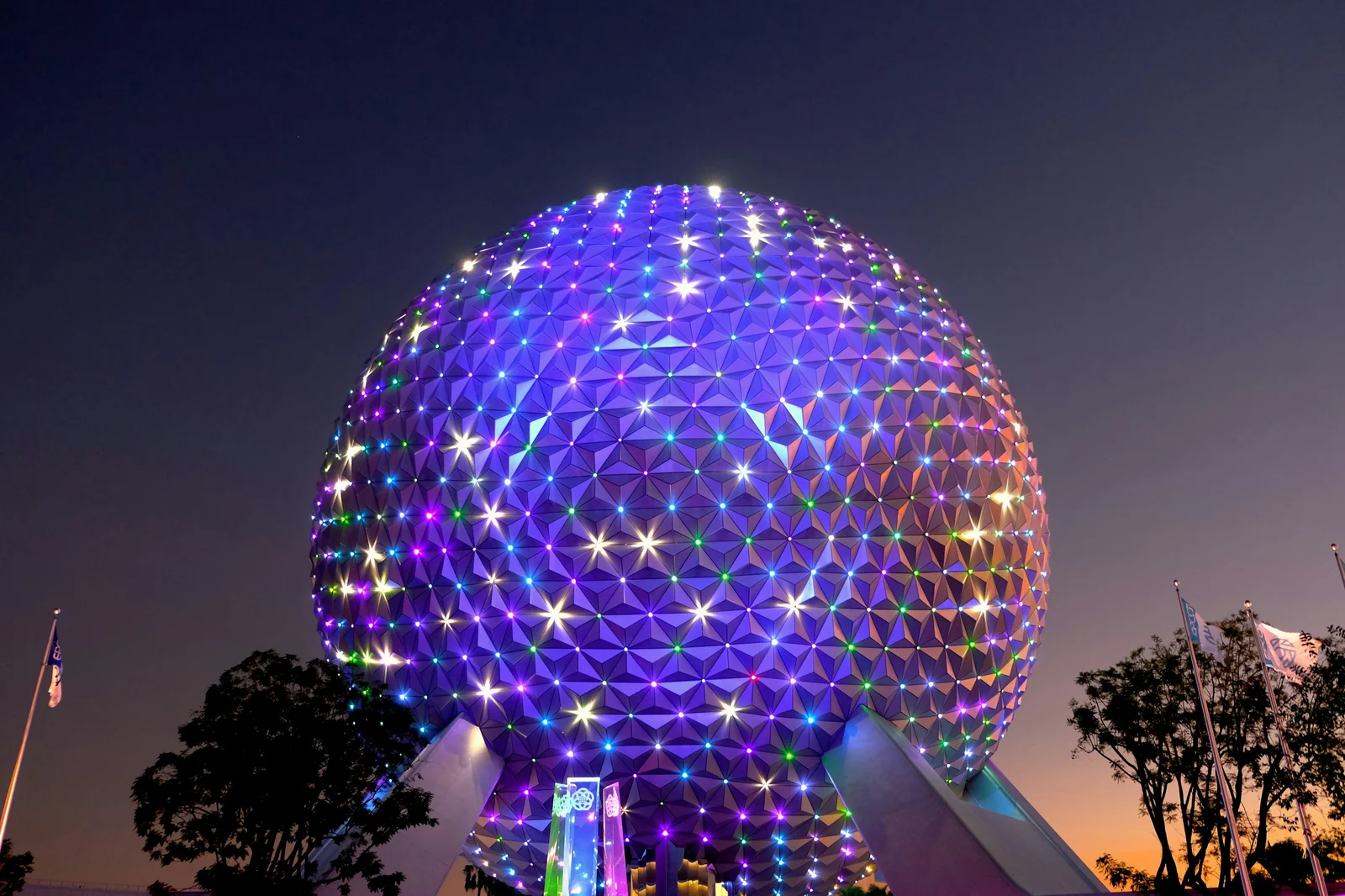 EPCOT Spaceship Earth lit up at night