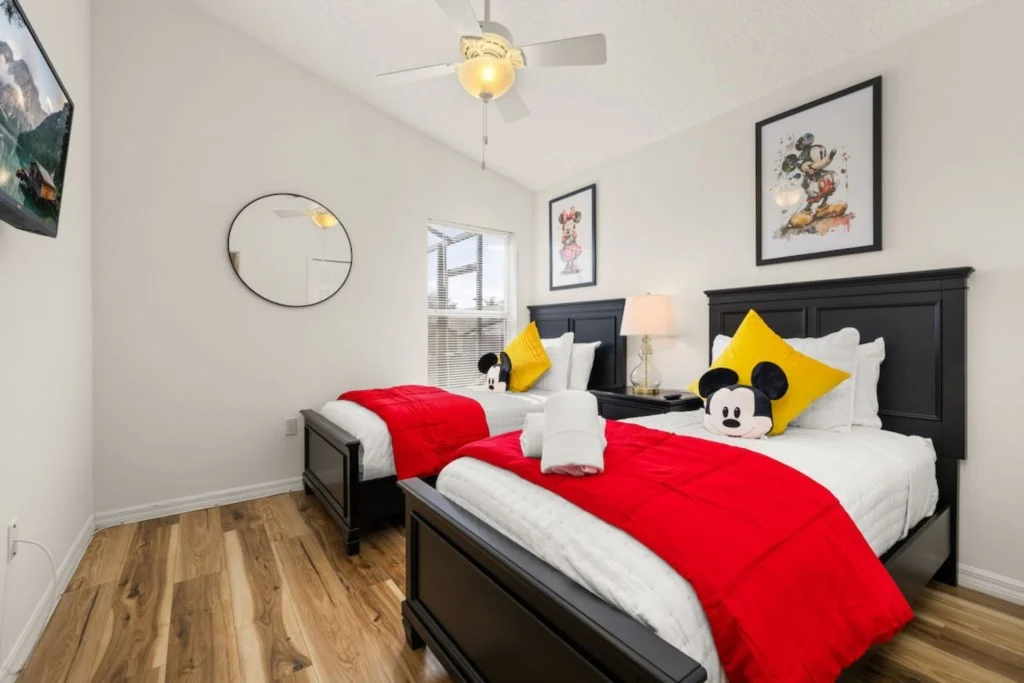 Refreshed vacation rental bedroom with updated paint and decor