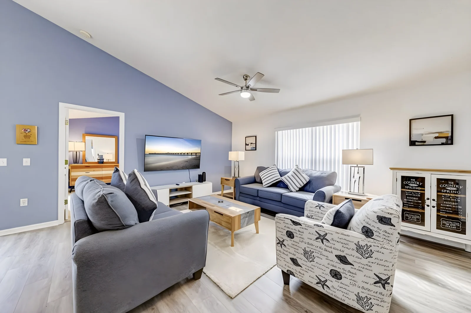 Styled vacation rental living area with curated furniture and accent pieces